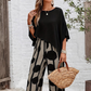 Set din două piese: top cu mâneci șapte sferturi + pantaloni imprimați