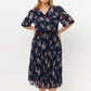 Rochie plisată florală elegantă